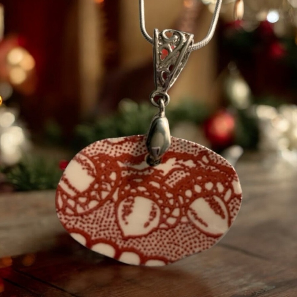 Mighty oaks grow from tiny acorns. Broken china pendant.